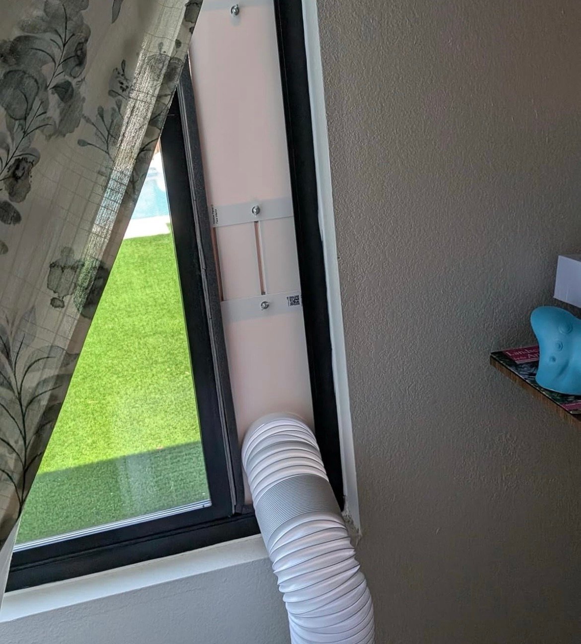 Venting out the window for portable AC unit